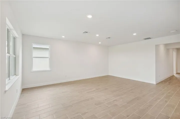 Empty room featuring light hardwood / wood-style floors