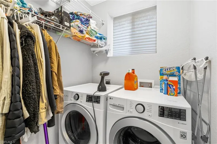 Laundry room featuring washer and dryer