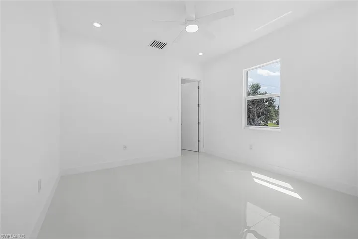 Bedroom featuring recessed lighting, baseboards, and a ceiling fan
