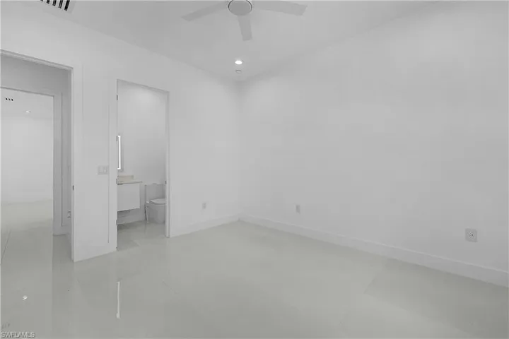 Bedroom featuring baseboards, recessed lighting, and a ceiling fan