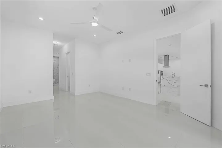 Primary bedroom with ceiling fan