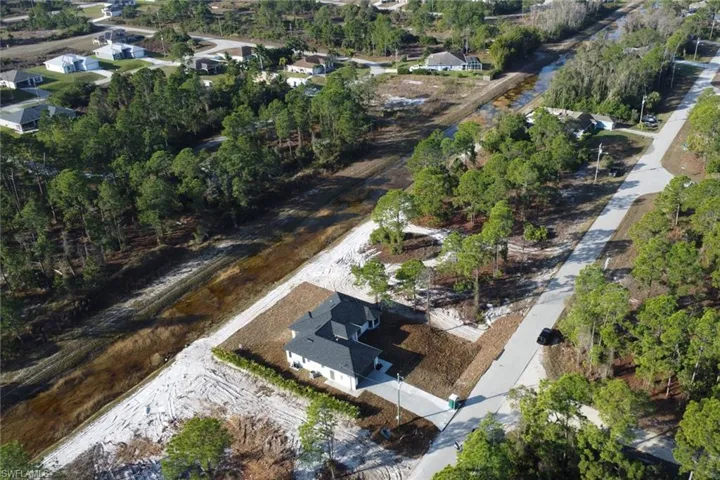 Aerial view of property and surrounding area