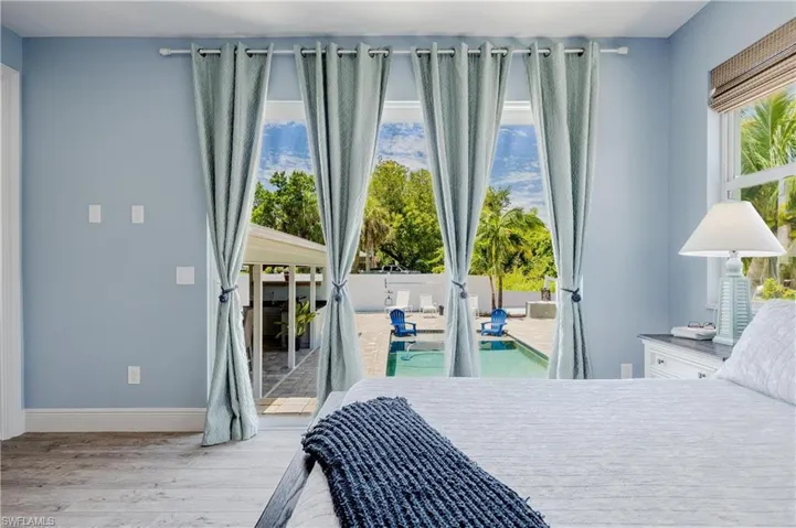 Bedroom with wood-type flooring
