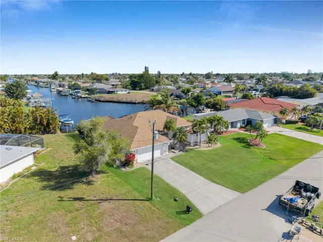 Aerial view of residential area with a nearby body of water