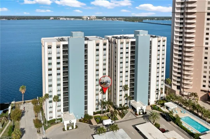 Aerial view of the waterfront property along the river in downtown Fort Myers