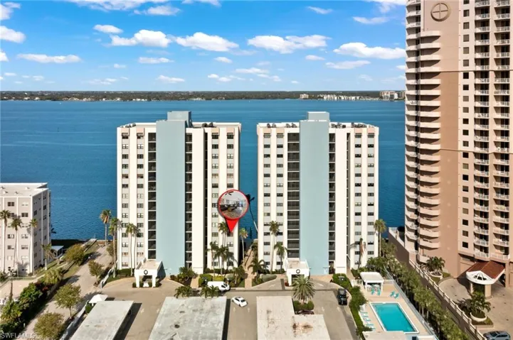 Aerial view of the waterfront property along the river in downtown Fort Myers
