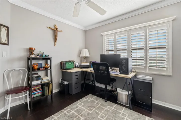 Guest bedroom with new hard wood floors used as office.