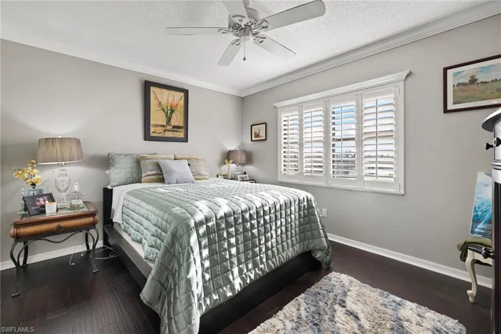 Guest bedroom with new hardwood floors.