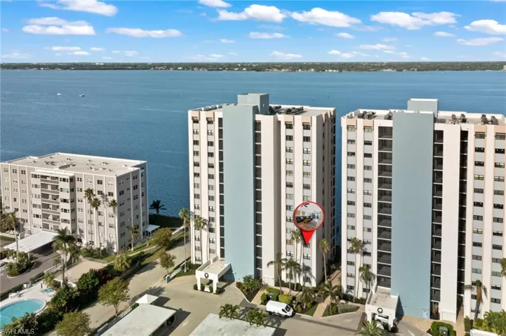 Aerial view of the waterfront property along the river in downtown Fort Myers