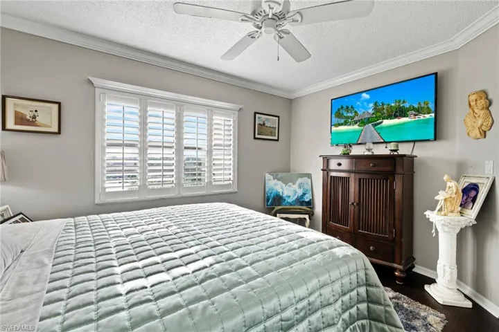 Guest bedroom with new hardwood floors.