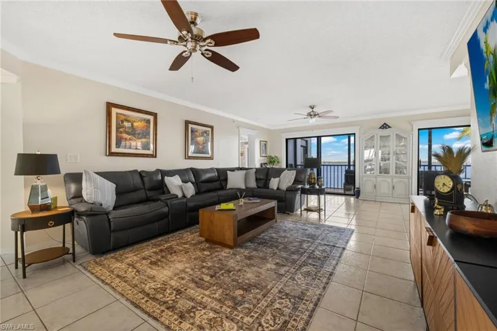 Large open living room that leads out to the balcony