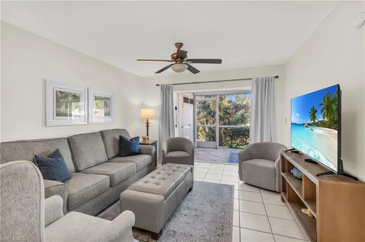 Furnished Living room with ceiling fan and light tile patterned floors