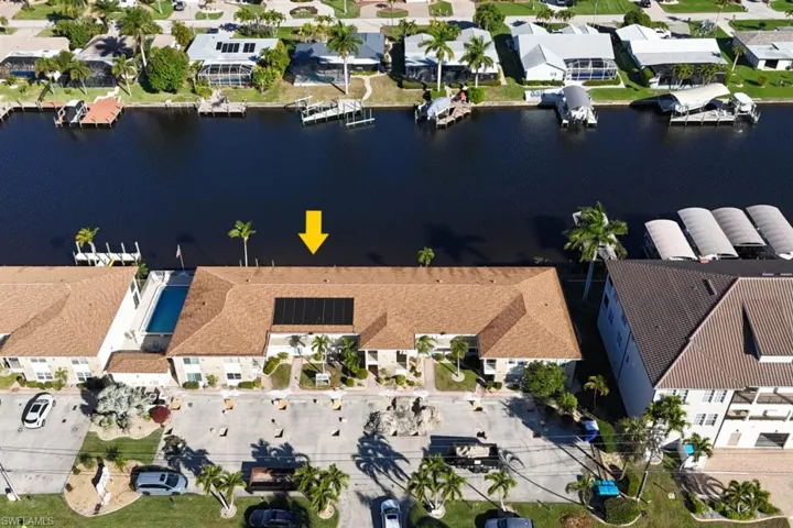 View of property location with nearby suburban area