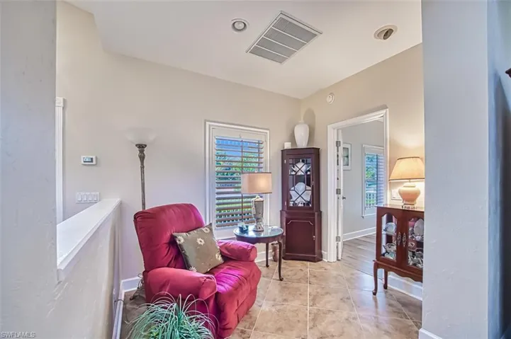 Sitting room featuring light tile patterned floors