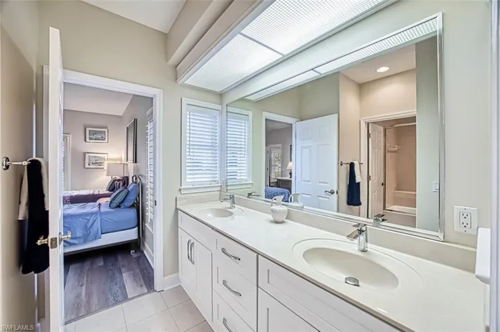 Bathroom featuring vanity and tile patterned floors