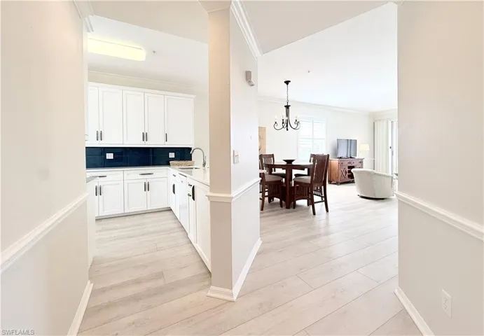 Light tone Luxury Vinyl Plank Flooring Throughout Main Living Area