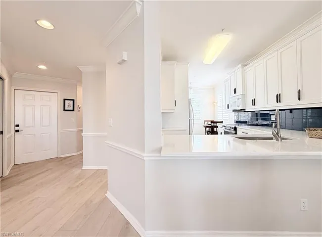From Living Area to Hallway With Guest BR and Bath