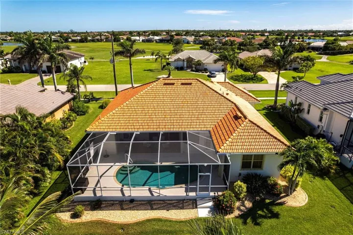 Aerial view of residential area with a pool