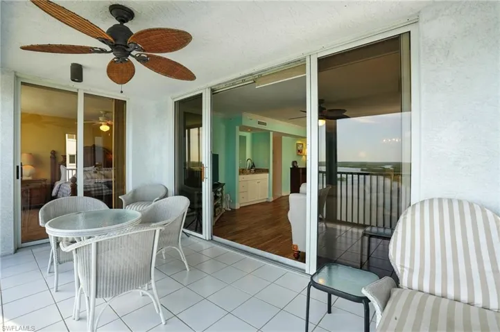 Balcony featuring ceiling fan - Virtually Edited Image