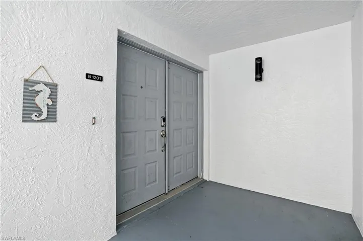 Entry doors with stucco siding - Virtually Edited Image