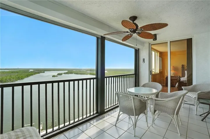 Balcony featuring a water view - Virtually Edited Image