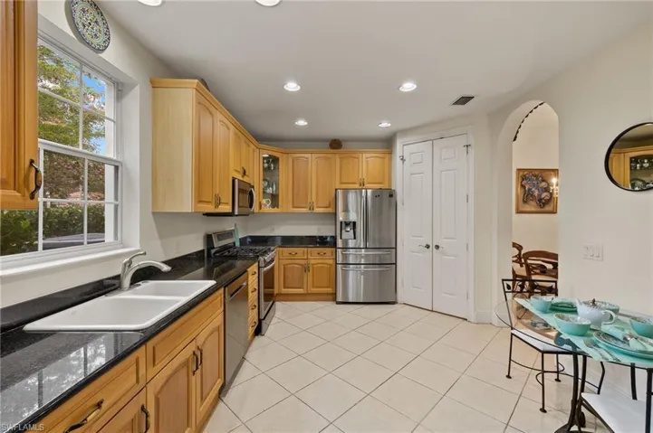 Granite, Stainless steel appliances including newer tri-part fridge