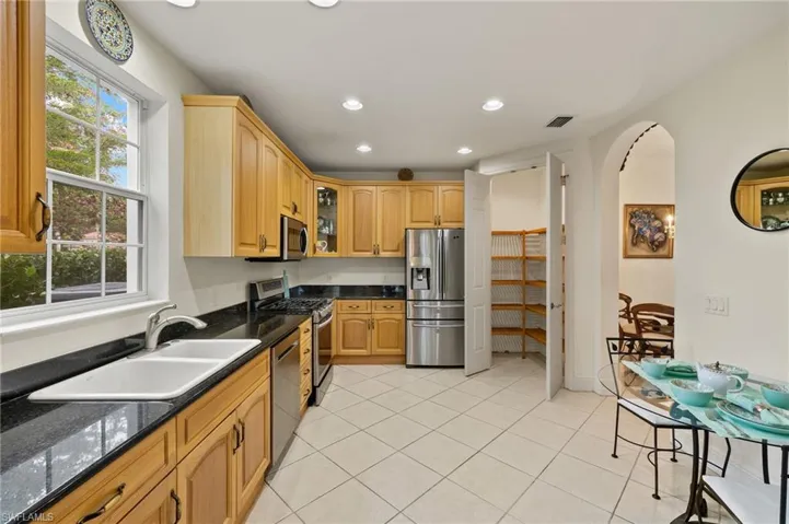 Spacious walk in pantry with shelving