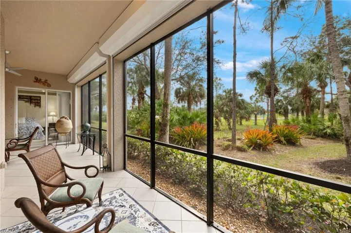 Note electric hurricane shutters above screen
