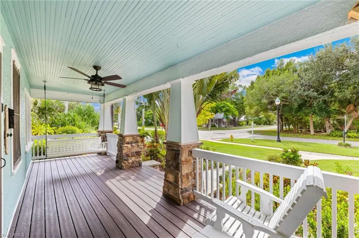 Wooden porch with ceiling fan