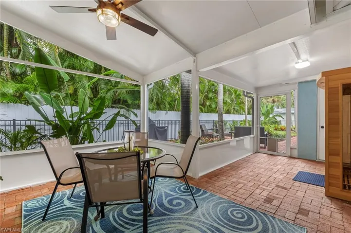 Sunroom / solarium featuring a sauna / steam room
