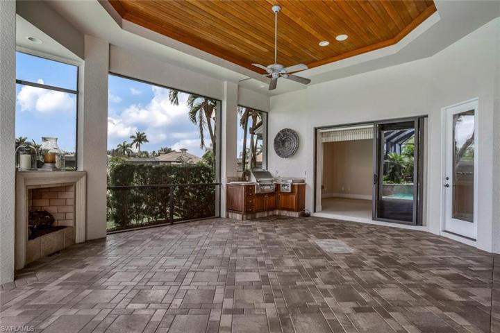 Outdoor Kitchen, Fireplace, Sliding Doors to Third Guest Bedroom Suite