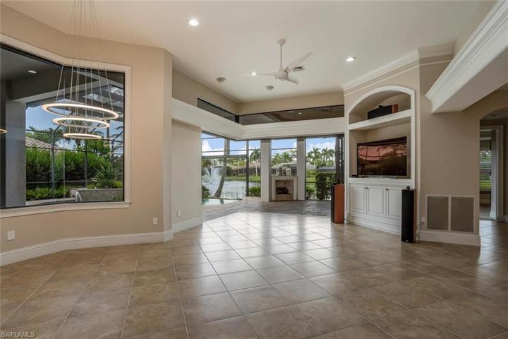 View from the Kitchen, to the 90' Pocketing Sliding Doors to Lanai, Outside Gas Fireplace View