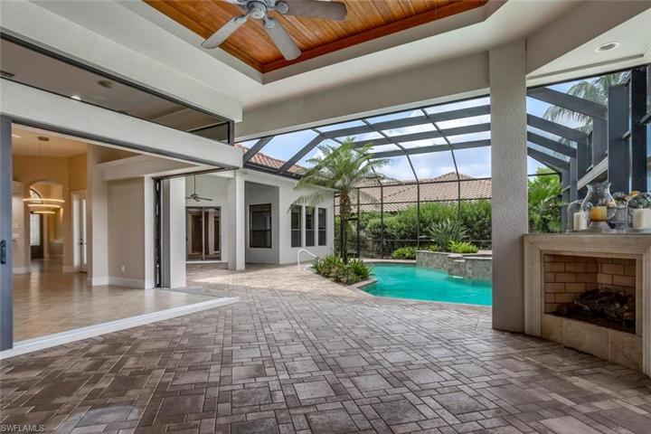 Lanai Corner Pocketing Sliding Glass Doors, Gas Fireplace, Wood Ceiling