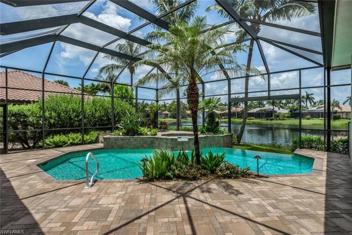Heated Infinity Edge Pool and Spa overlooking Lake Views, w/ Lush Landscaping