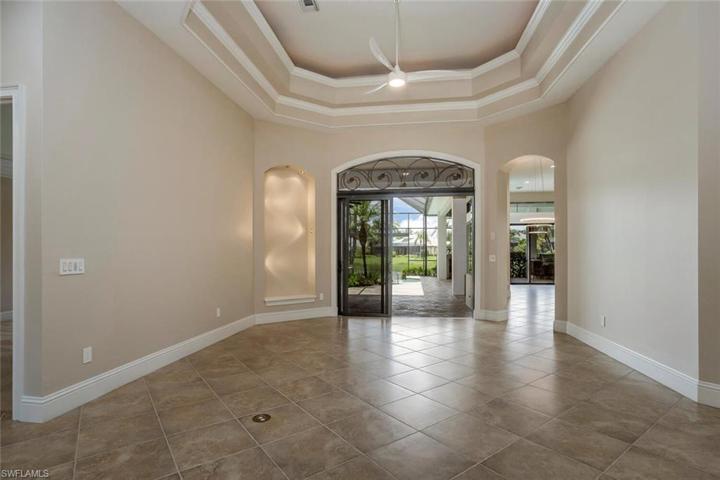 Formal Living to Lanai View from Front Door, Sliding Doors and Lighted Niche