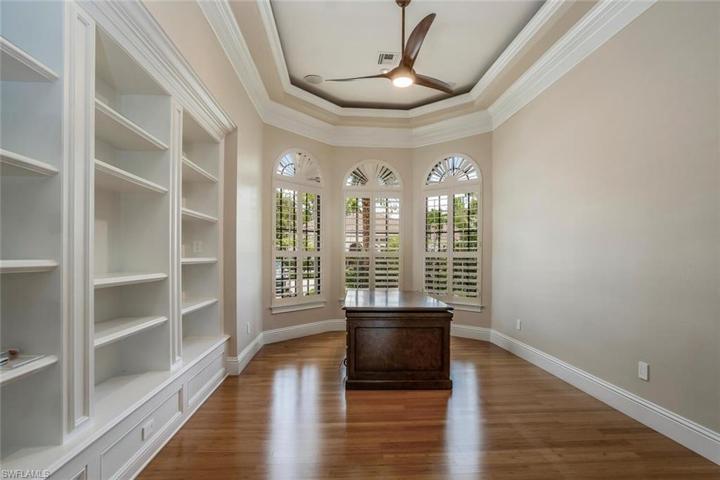 Home Office w/ Built-in Bookshelves, Wood Flooring, Coffered Ceilings