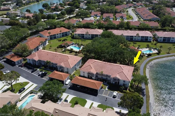 Drone / aerial view of end unit condo rarely available!