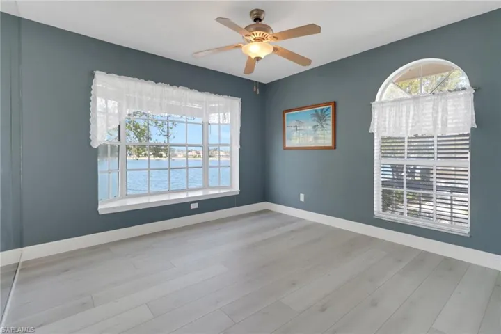 Bedroom with plenty of natural light and lake views!