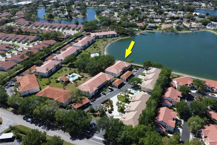 Drone / aerial view of end unit property with water views!