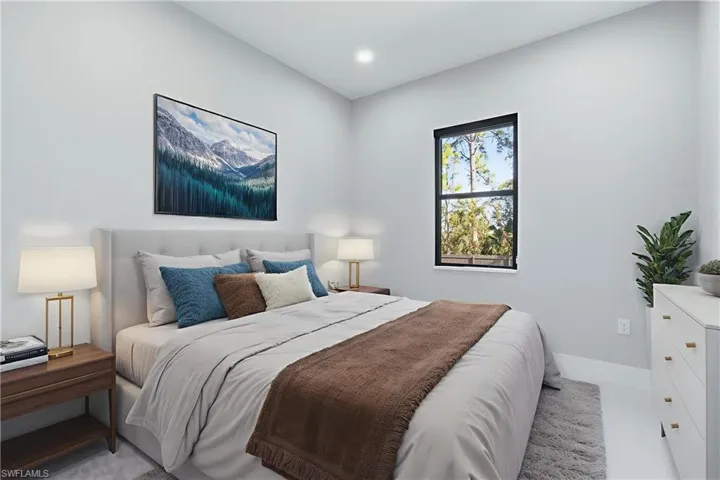Bedroom featuring recessed lighting and baseboards