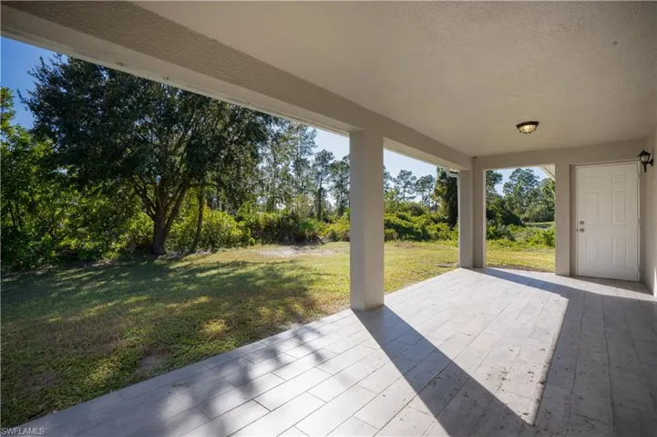 View of patio / terrace with view of scattered trees