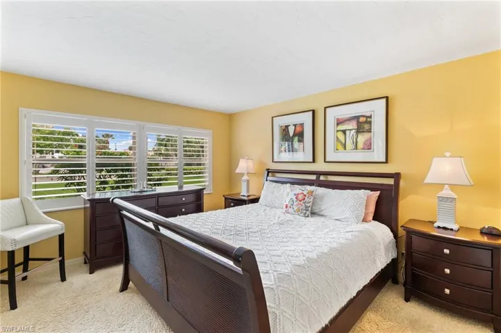 Large primary bedroom, large windows