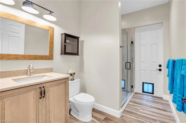 Bedroom featuring light wood-type flooring and ceiling fan