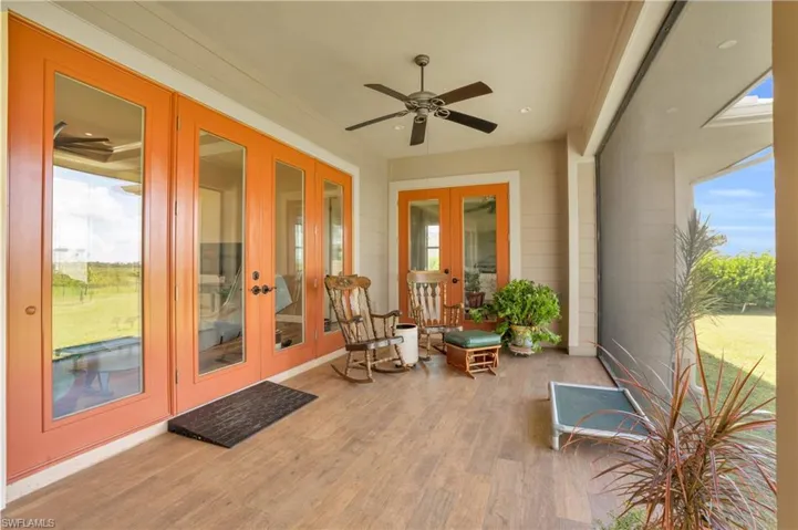 Sunroom / solarium with plenty of natural light and ceiling fan