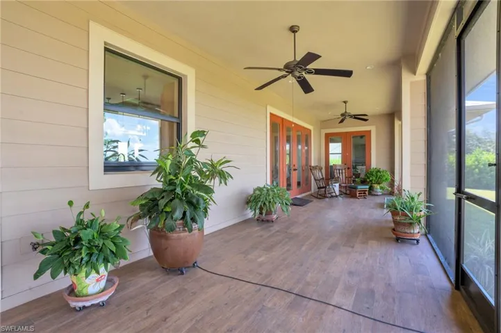 View of patio / terrace featuring french doors and ceiling fan