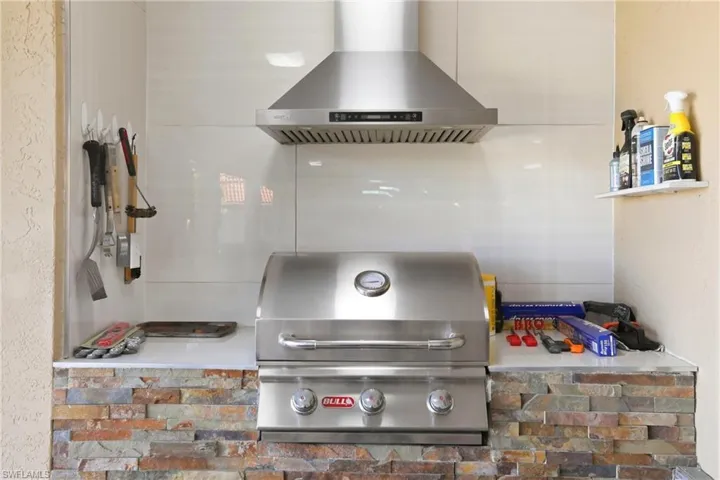 Kitchen with ventilation hood