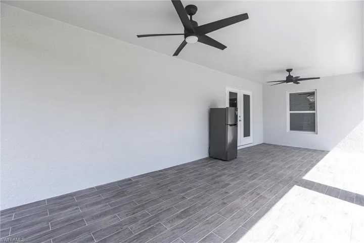 View of patio with ceiling fan