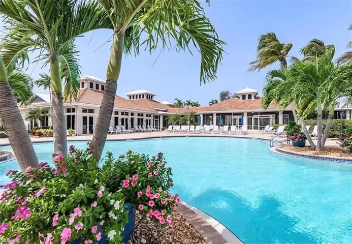 Community pool with a patio area