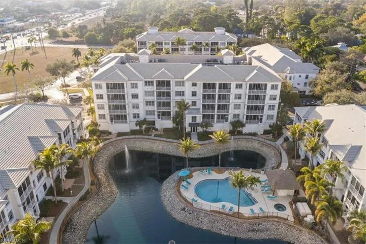 Bird's eye view of apartment complex / building and a large body of water