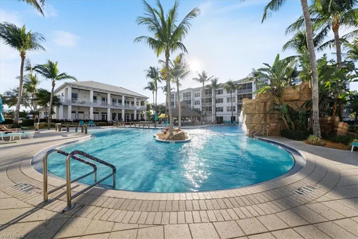 Community pool with a patio area